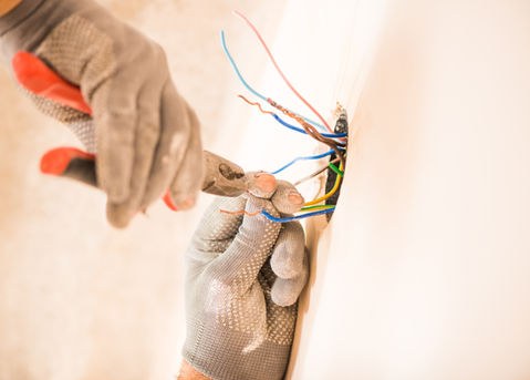Electrician working with wiring